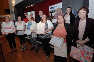 Volunteers receiving certificates. Communities First Celebrations